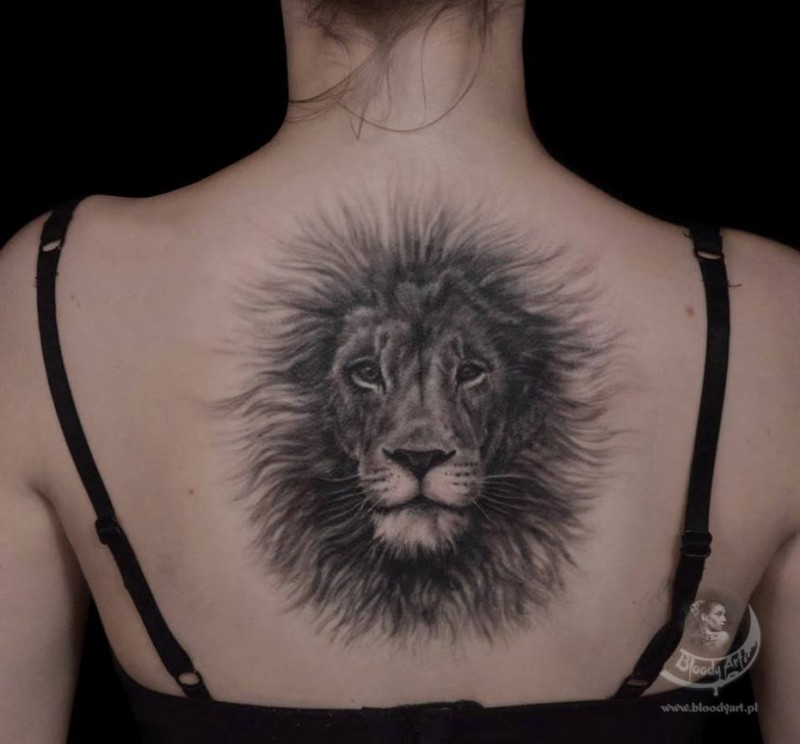 Fluffy lion tattoo