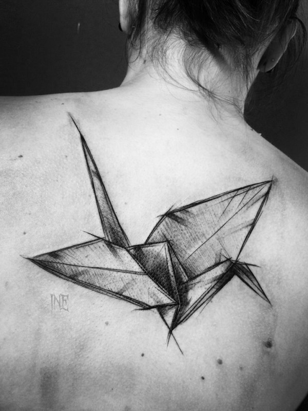 Origami bird tattoo