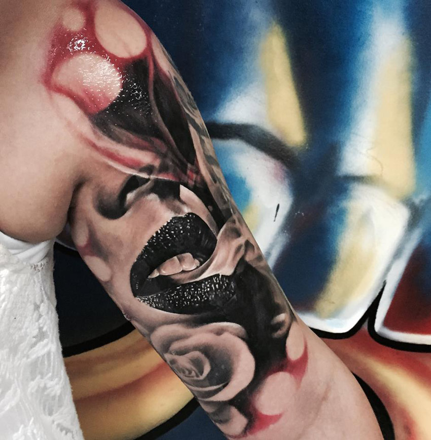 Smoke lips arm tattoo