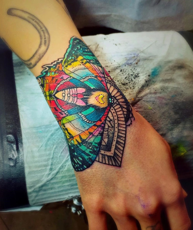 Moth Wrist Tattoo