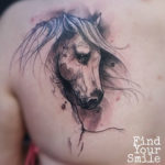 Horse sketch back tattoo