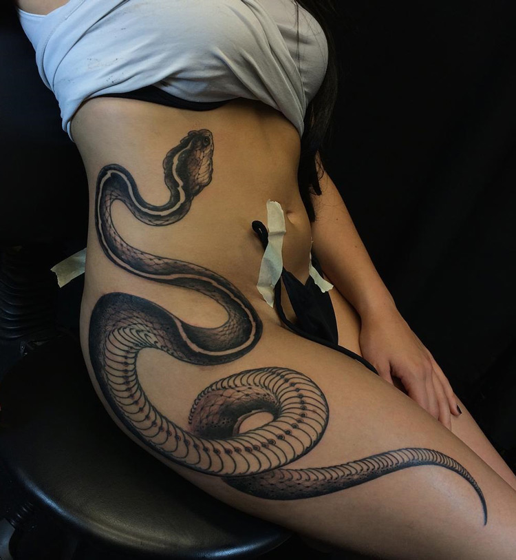 Black snake tattoo