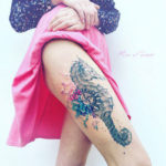 Seahorse thigh tattoo