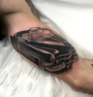 Retro Cadillac guy's arm tattoo
