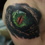 Dragon eye shoulder tattoo