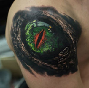 Dragon eye shoulder tattoo