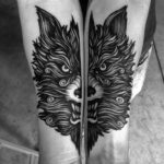 Angry wolf tattoo