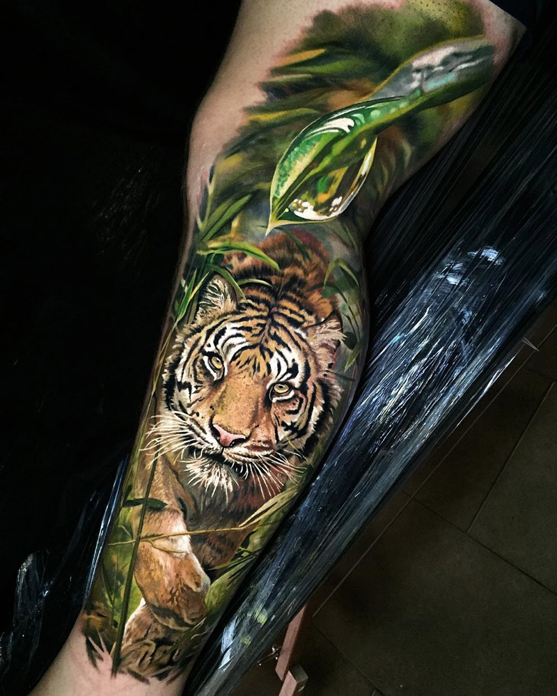 Tiger in the jungle realism tattoo