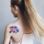 Unicorn girls shoulder tattoo