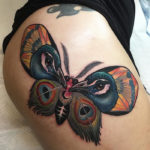 Peacock Moth Hip Tattoo