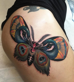 Peacock Moth Hip Tattoo