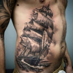 Sailing ship side tattoo