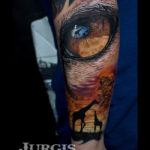 Giraffes & Lion Eye Tattoo