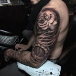 Rose & Clock Arm Tattoo