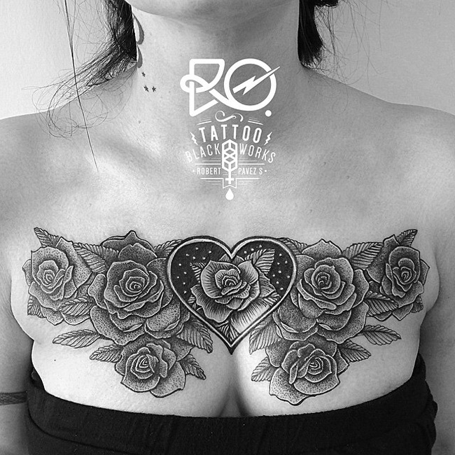 Roses and dark heart tattoo on girls chest, done by Robert Pavez, ...