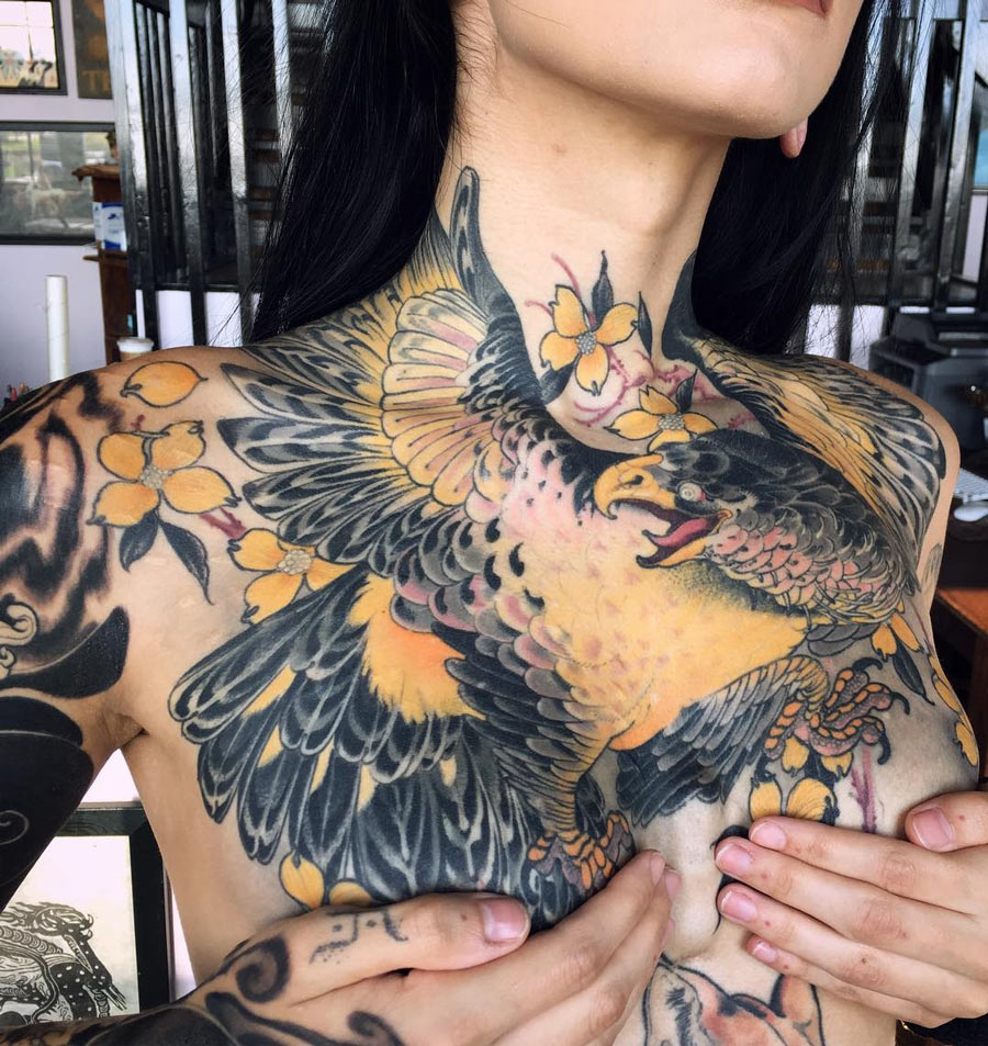 Eagle tattoo on girl's chest