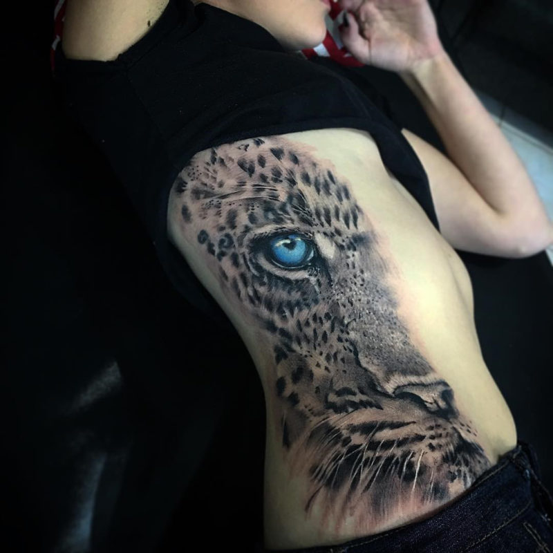 Blue-Eyed Leopard Side Tattoo