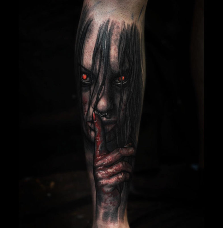 Devil with glowing eyes tattoo