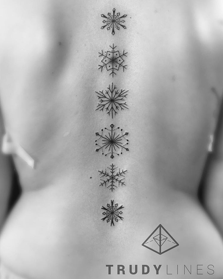 Snowflakes Spine Tattoo