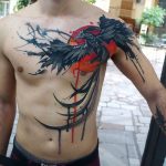 Phoenix reborn chest tattoo