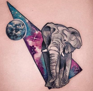 Space elephant, girl's hip tattoo