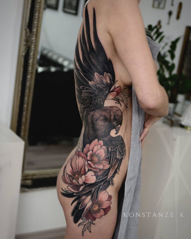 Golden eagle & peonies side tattoo
