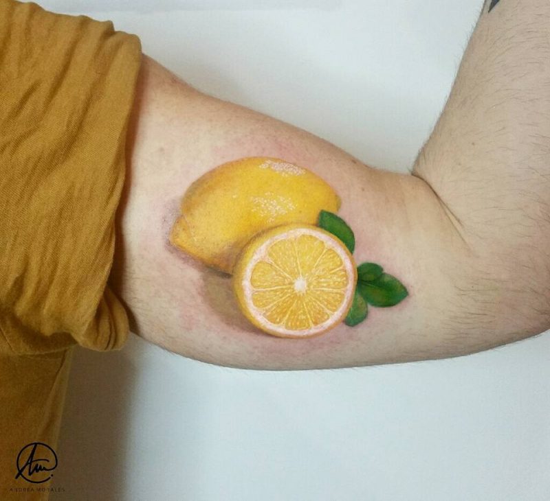 Lemon tattoo, realism men's bicep