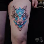 Wolf mandala thigh tattoo