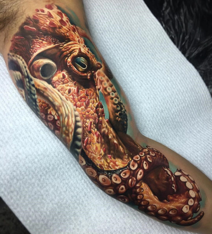 Inner bicep Octopus realistic tattoo