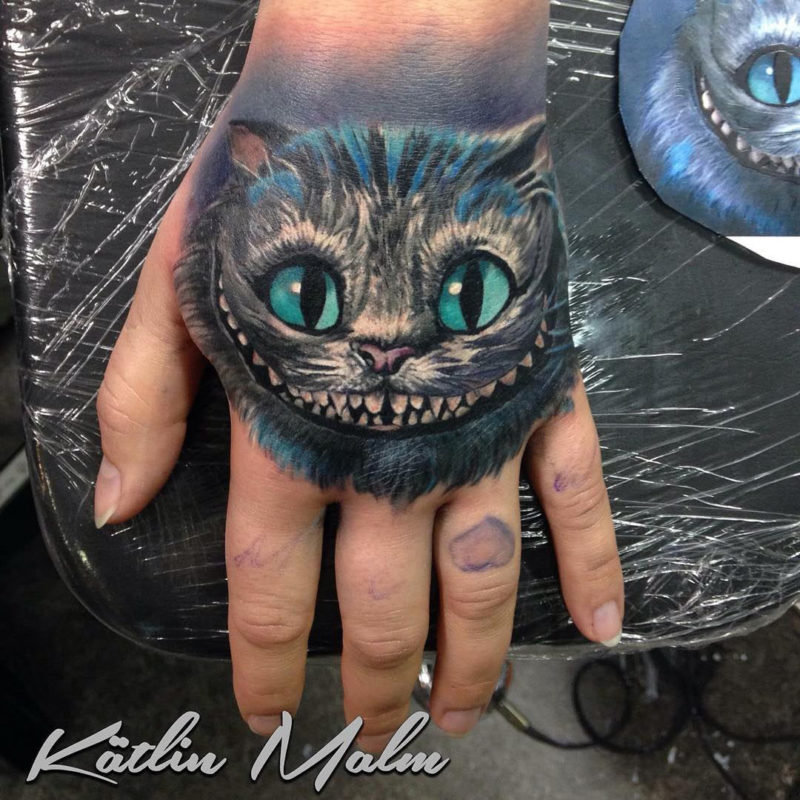 Cheshire Cat Hand Tattoo
