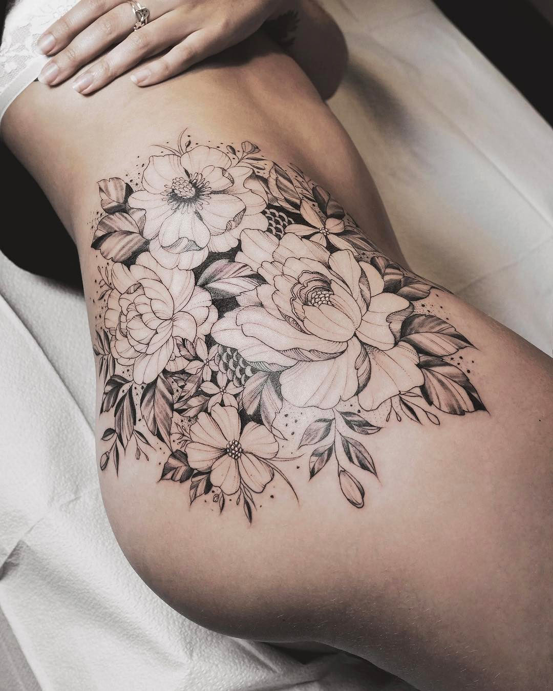 Floral hip tattoo