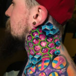 Trippy geometric space neck tattoo