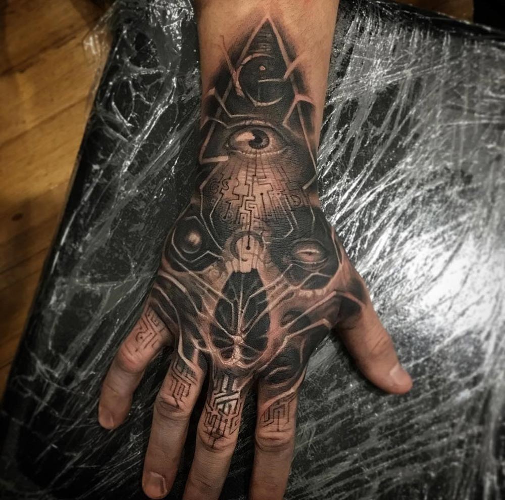 Cyber Illuminati hand tattoo