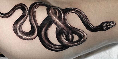 Snake hip tattoo
