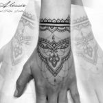 Ornamental Henna Hand Tattoo