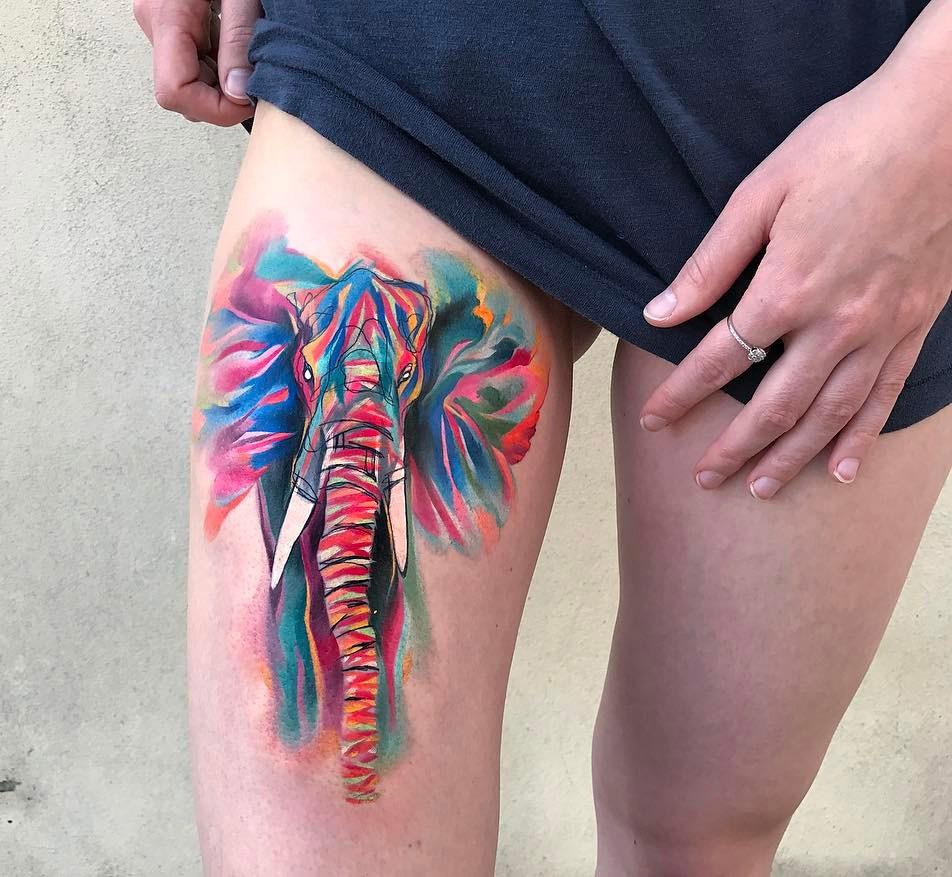 Watercolor elephant thigh tattoo