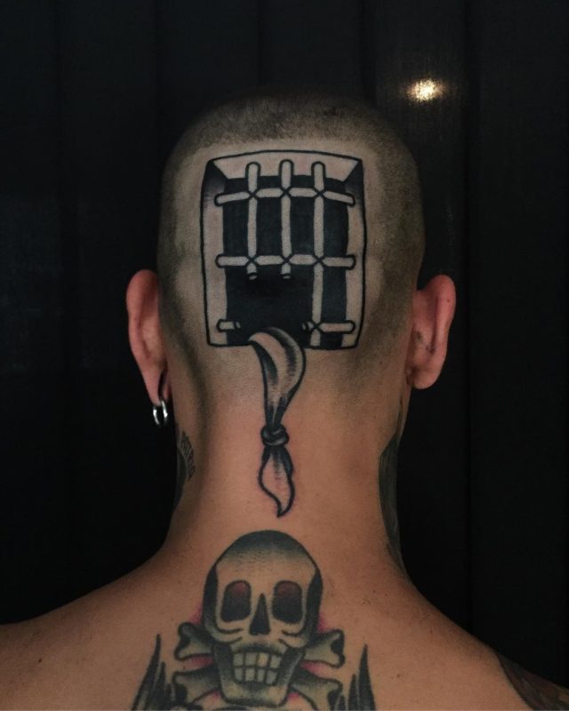 Prison escape head tattoo