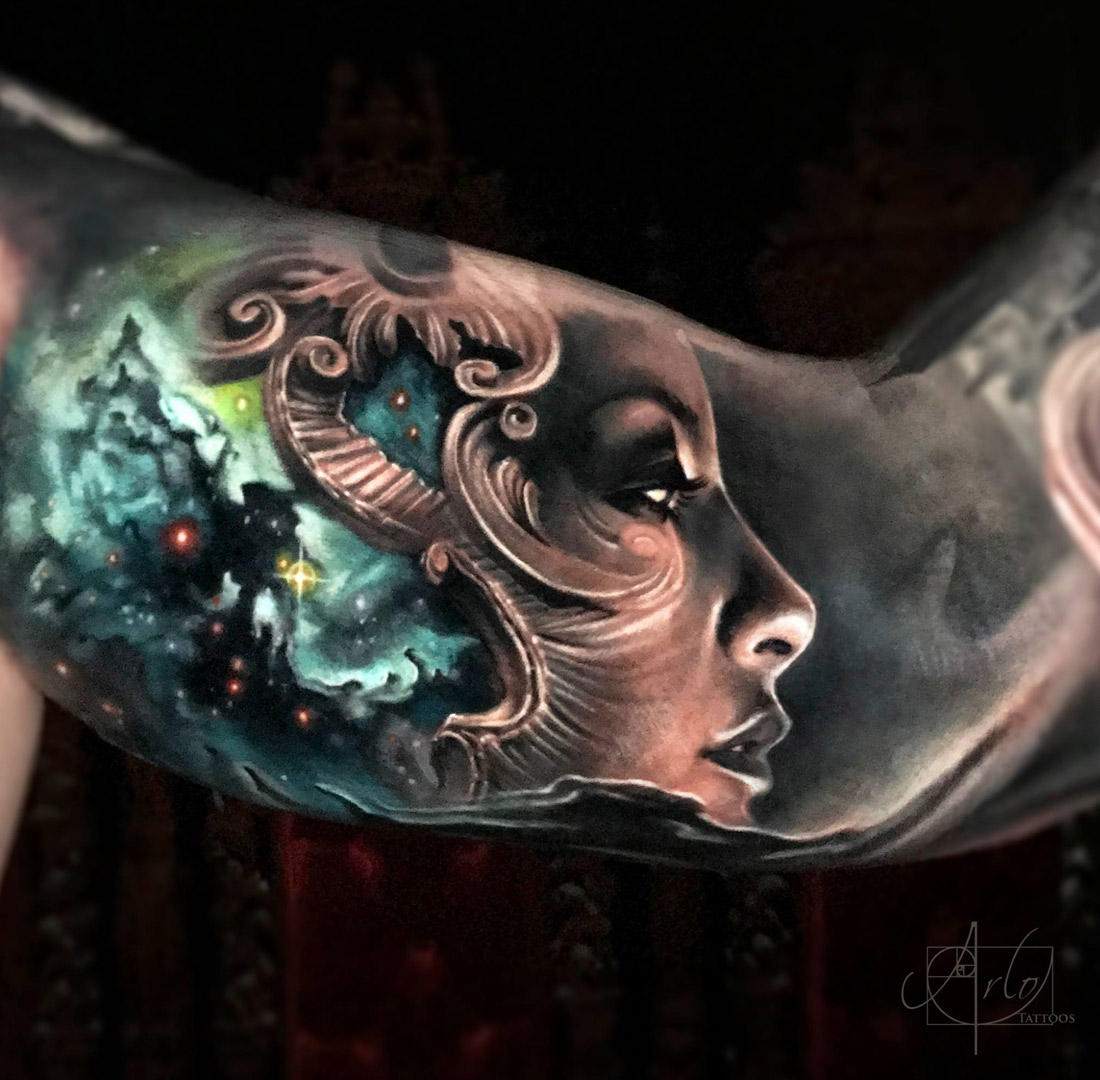 Galaxy Lady bicep tattoo