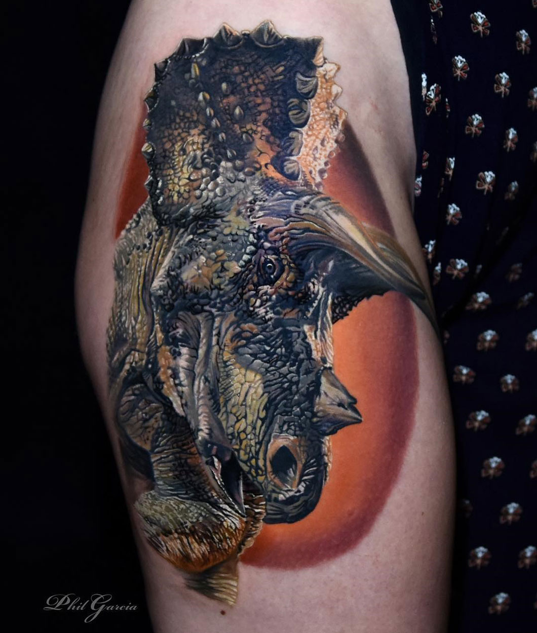 Triceratops thigh tattoo