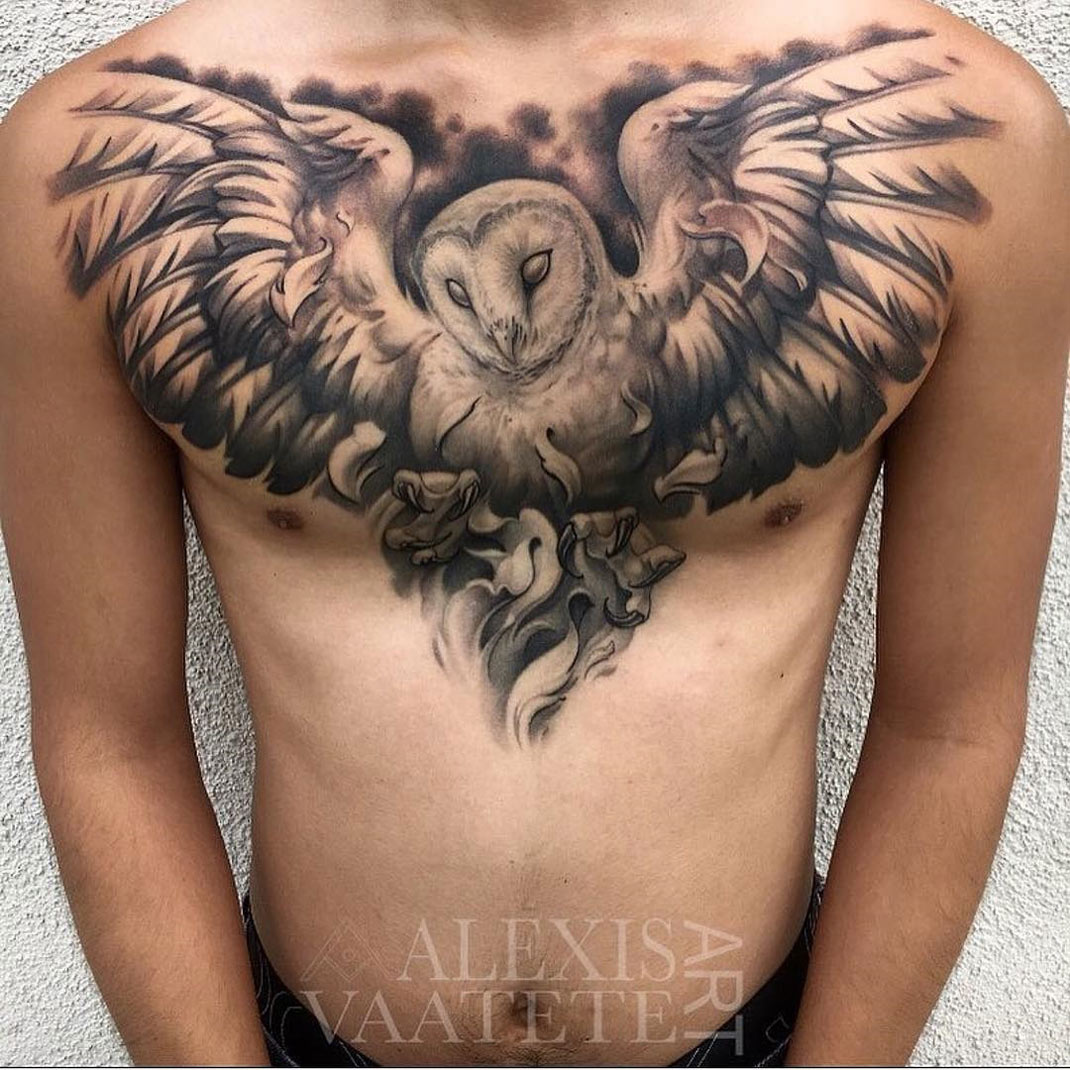 Owl, wings spread on mens chest