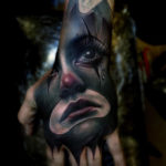 Sad Clown Hand Tattoo