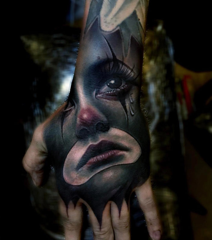 Sad Clown Hand Tattoo