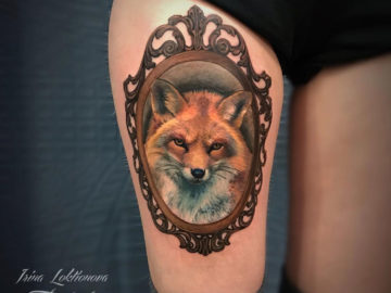 Fox Portrait on girl's leg