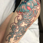 Large jellyfish thigh tattoo