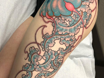Large jellyfish thigh tattoo