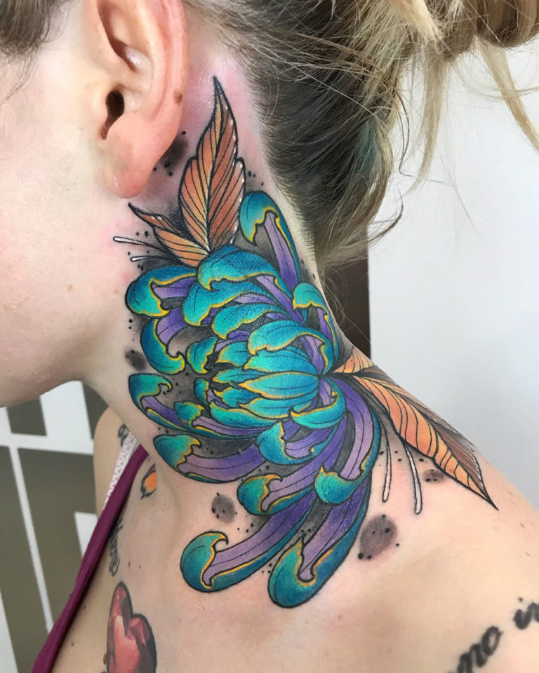 Chrysanthemum tattoo on the left side of the neck