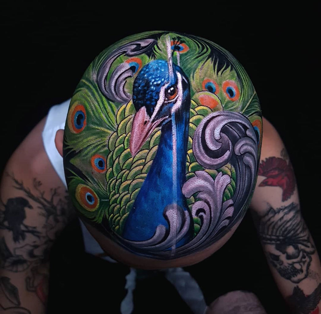 Peacock head tattoo