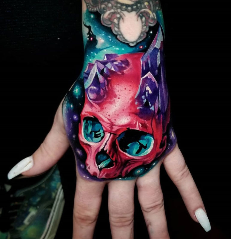 Pink skull & amethyst crystals hand tattoo