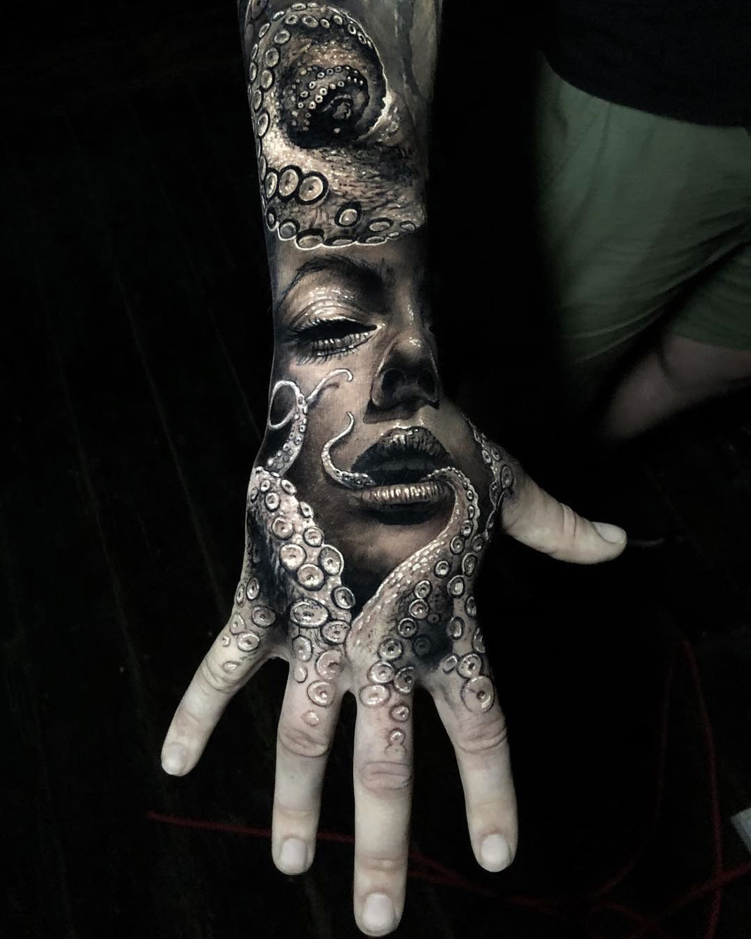 Portrait & octopus hand tattoo