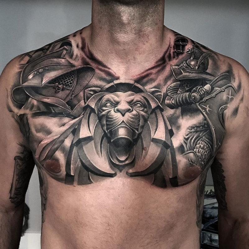 Fighting gladiators chest tattoo